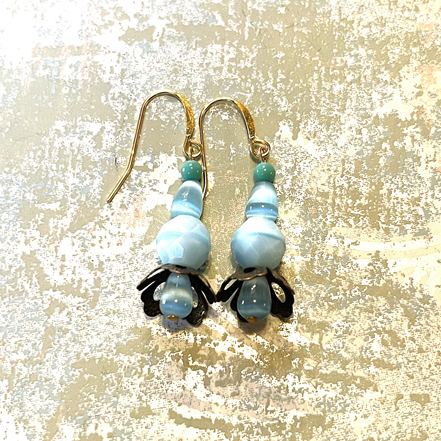 Shades of Blue with Green Glass beads with Metal Flowers Earrings. Hypoallergenic French Earring Hooks, Gold Plated Wire.