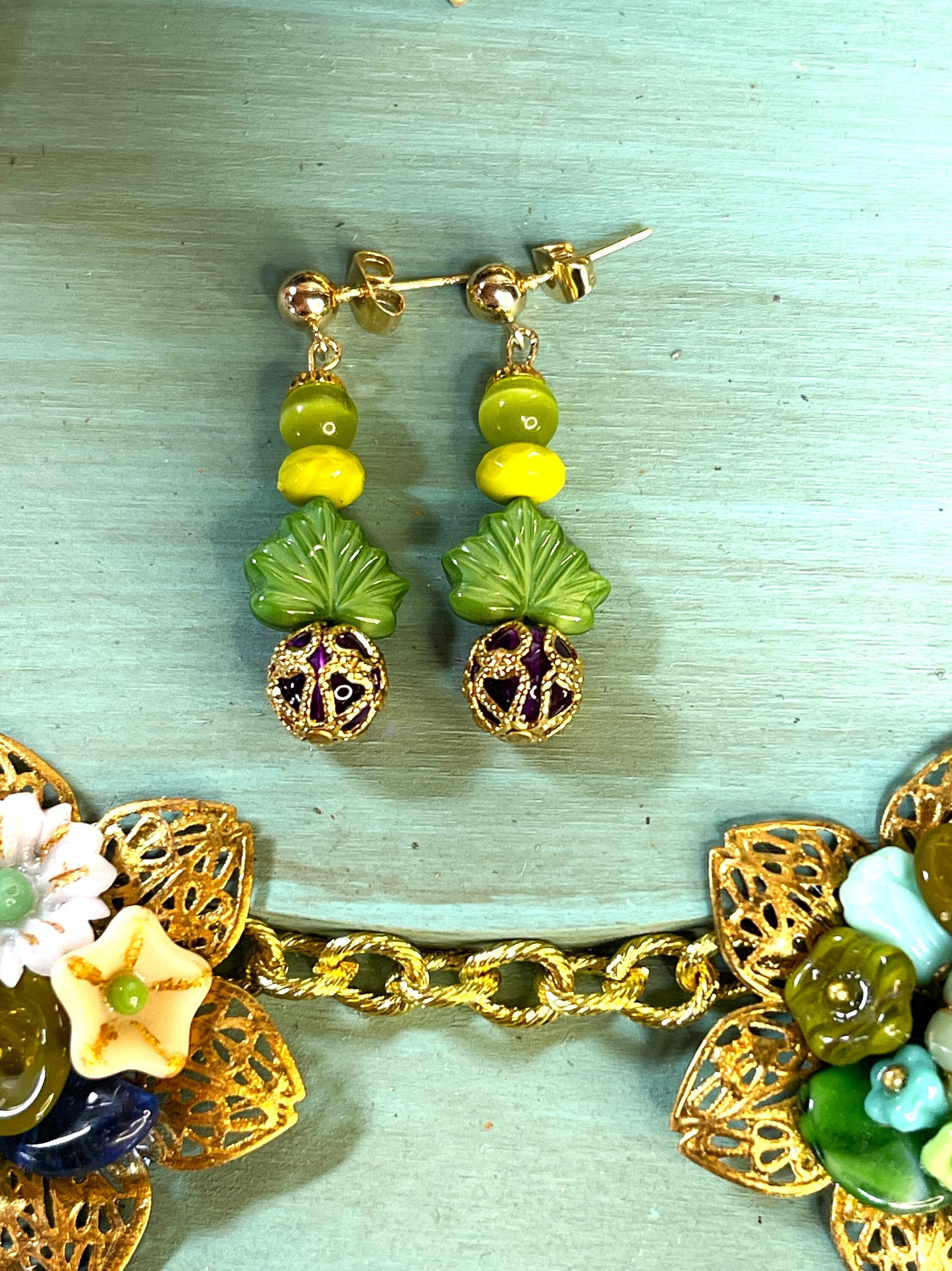 Green and Green Apple Czech Glass Leaves with Purple Filigree Caged Drops. Hypoallergenic French Earring Hooks, Gold Plated Wire