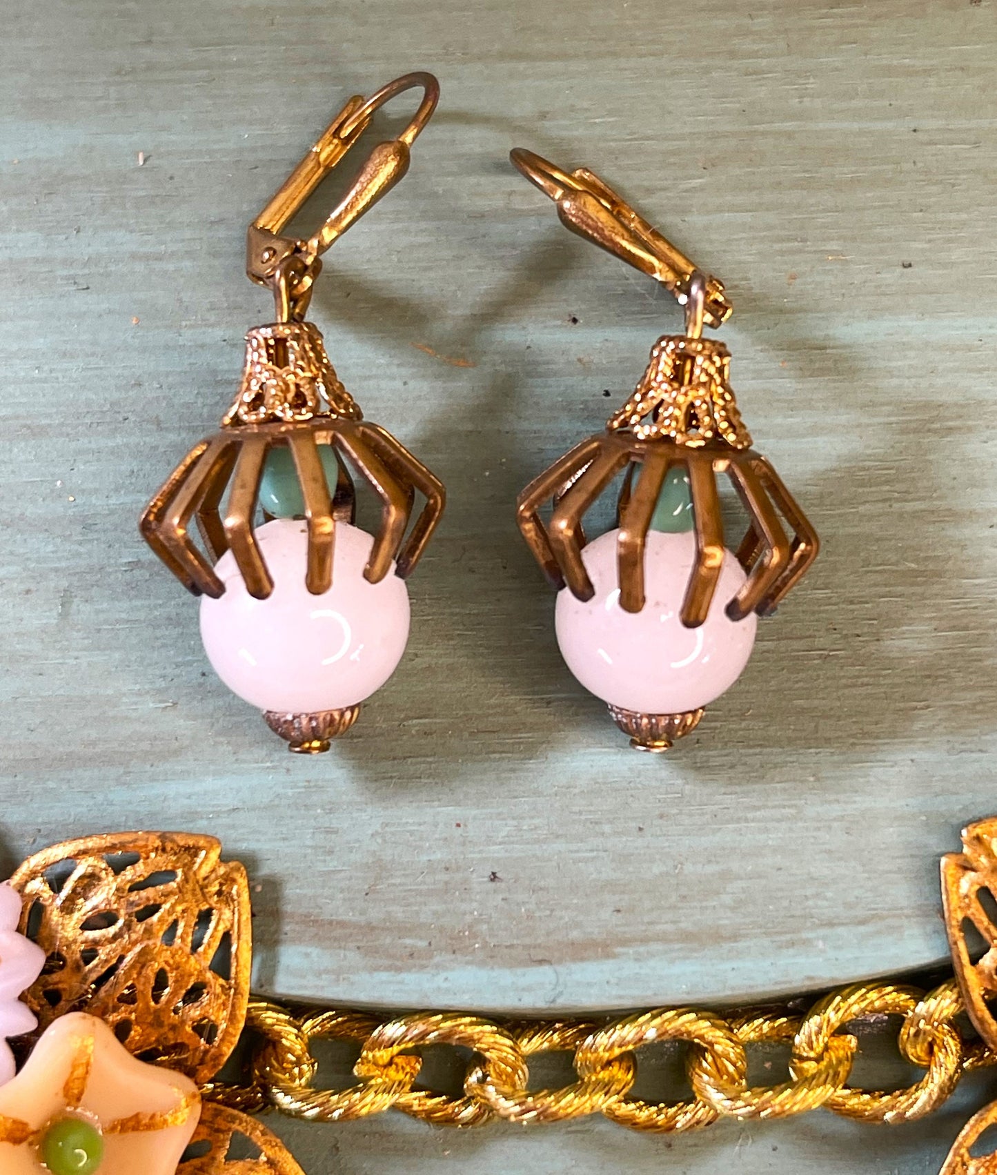 White and Sea Green Glass Beads, Caged in Brass. Earrings. Hypoallergenic French Earring Hooks, Gold Plated Wire.