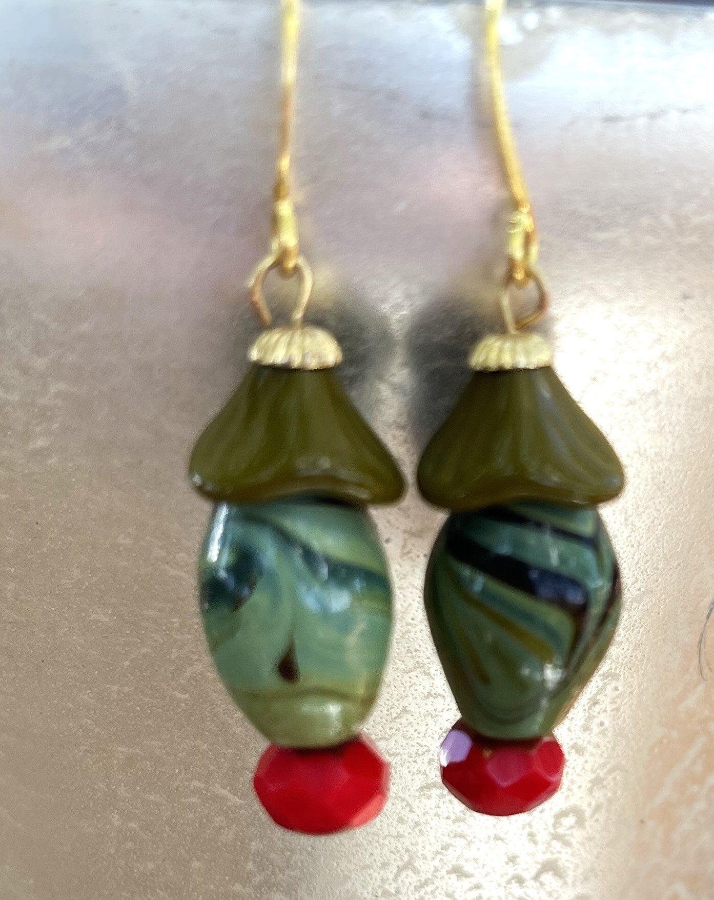1960's Japanese Olive, Black Swilrl Bead, and Red Glass Drop Beads, Hypoallergenic French Earring Hooks Gold Plated Brass.
