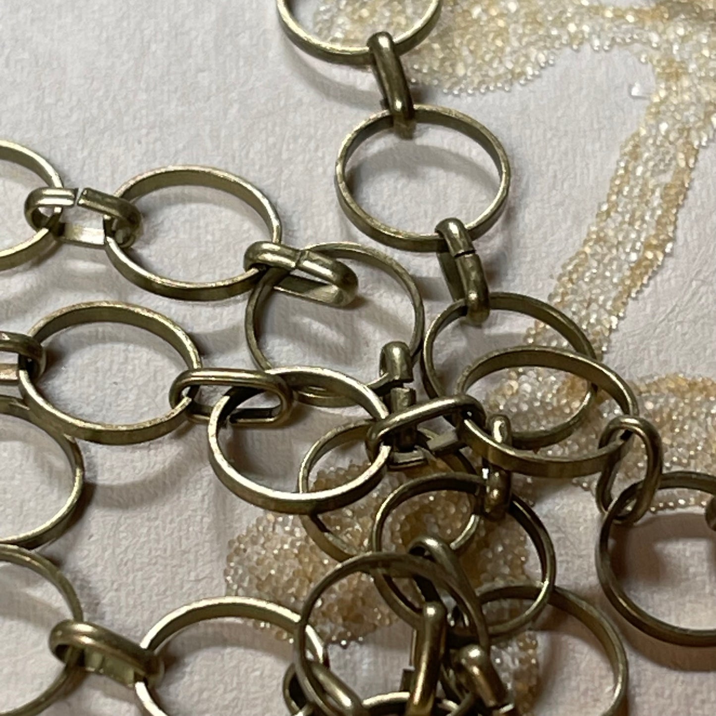 Round Link Chain, Antique Brass Color. 9mm Round Link. Sold by the foot.