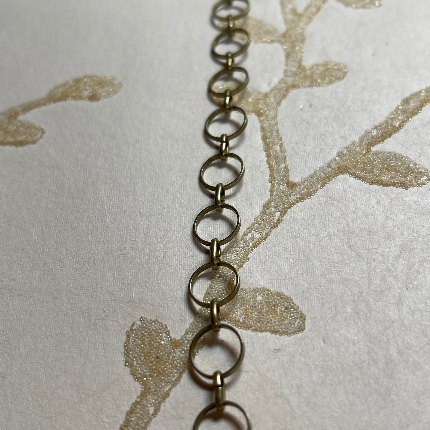 Round Link Chain, Antique Brass Color. 9mm Round Link. Sold by the foot.