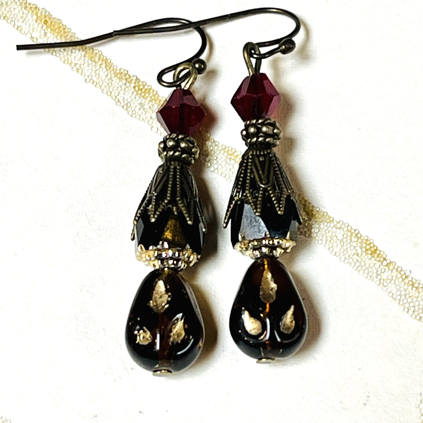 Black and Gold Czech Glass Beaded Earrings. Deep red check glass bead at the top. Hypoallergenic French earrings Hooks, Gold Plated Wire.