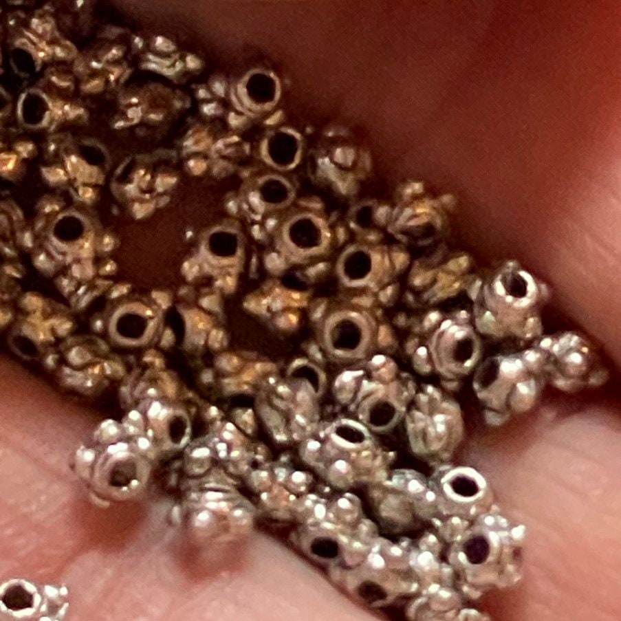 Tiny, Round, Antique Bronze, bumpy, Star Pattern beads. 100 per order