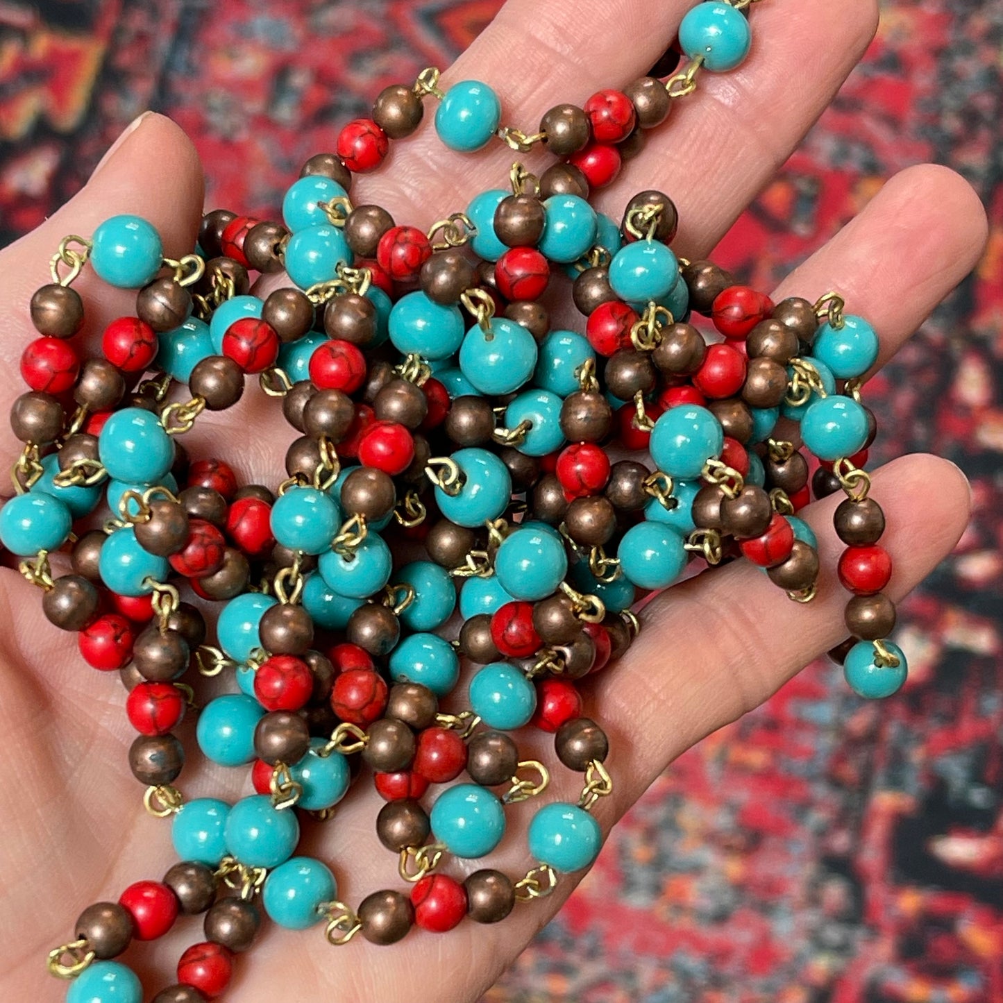 Handcrafted By The Bohemian Jewelry Co. 5.4mm and 7.2mm, South West Style Copper Red and Turquoise Glass Bead Chain. Sold by the foot.