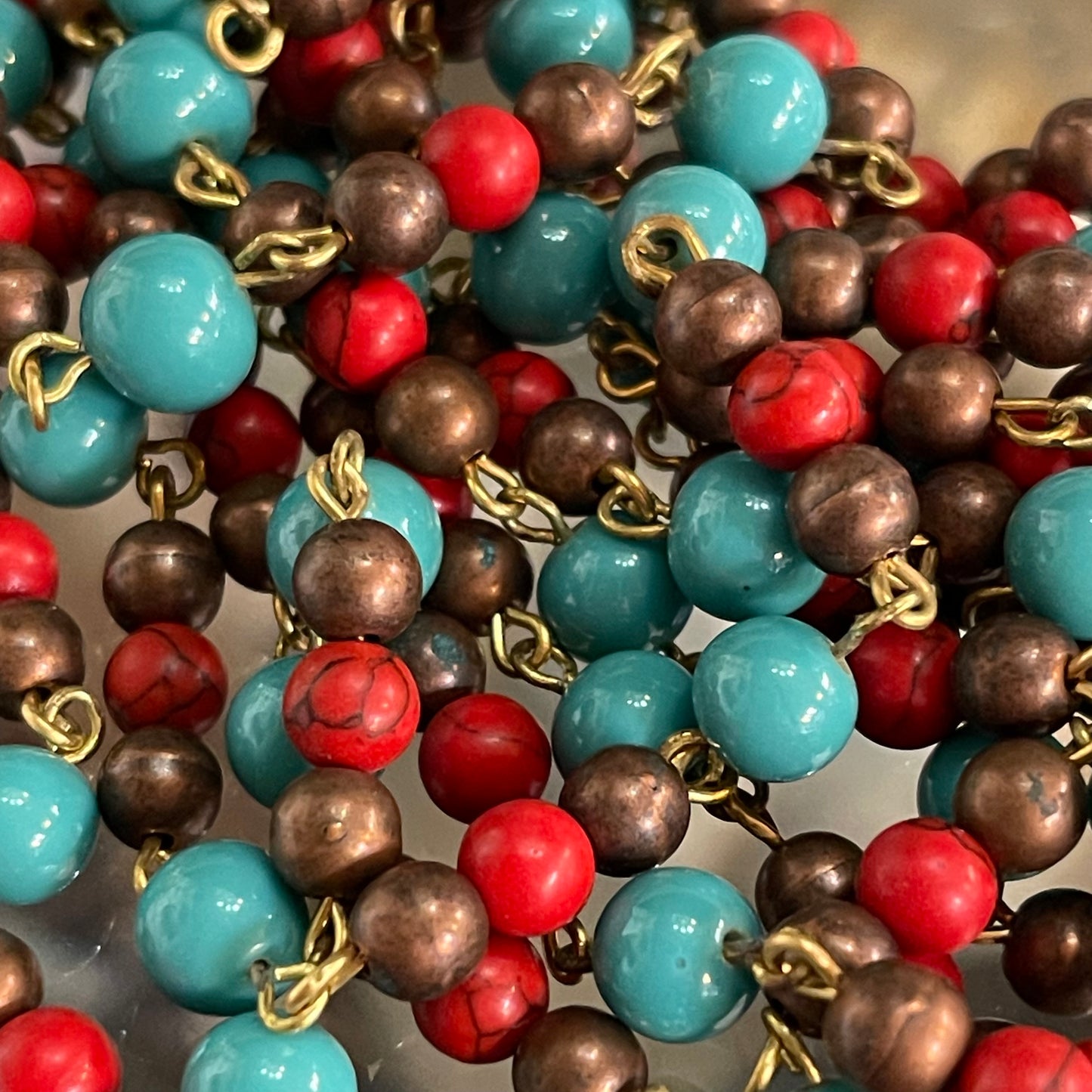 Handcrafted By The Bohemian Jewelry Co. 5.4mm and 7.2mm, South West Style Copper Red and Turquoise Glass Bead Chain. Sold by the foot.
