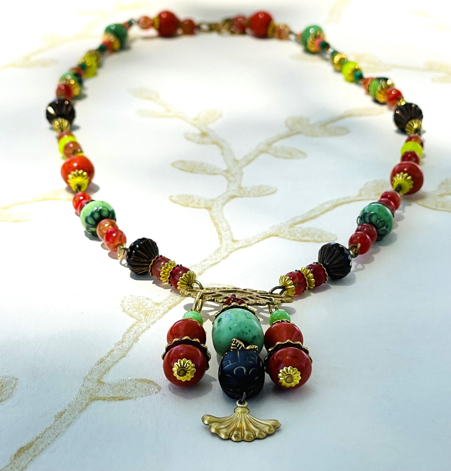 Vintage Glass beads With Green, Black, Gold, and Orange. Egyptian-style Black and gold Scarab Necklace.